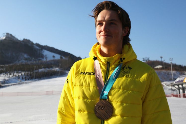 Snowboarder SCOTTY JAMES of Australia poses with his bronze medal in the Men's Half Pipe in Pyeongchang-gun, South Korea.