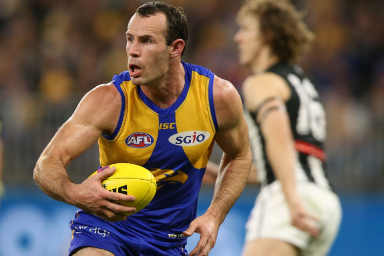 SHANNON HURN of the Eagles looks to pass the ball during the AFL Second Qualifying Final match between the West Coast Eagles and the Collingwood Magpies at Optus Stadium in Perth, Australia.