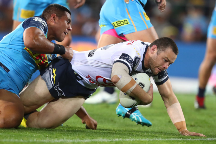 SHAUN FENSOM of the Cowboys scores a try during the round 25 NRL match between the Gold Coast Titans and the North Queensland Cowboys at Cbus Super Stadium in Gold Coast, Australia.