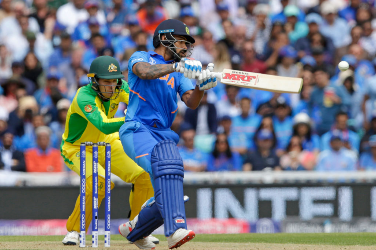 SHIKHAR DHAWAN of India plays a shot during the Group Stage match of the ICC Cricket World Cup 2019 between India and Australia at The Oval in London, England.