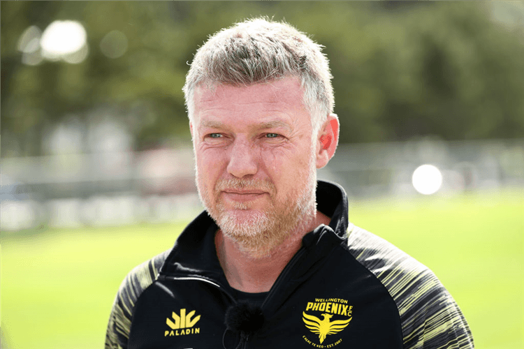 Coach UFUK TALAY talks to media during a Wellington Phoenix training session at Martin Luckie Park in Wellington, New Zealand.