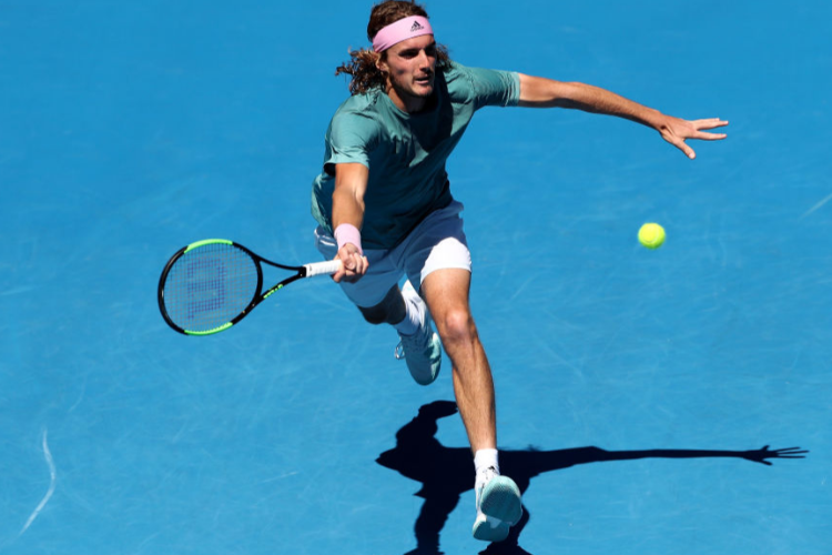 STEFANOS TSITSIPAS of Greece plays a forehand during the Australian Open at Melbourne Park in Melbourne, Australia.