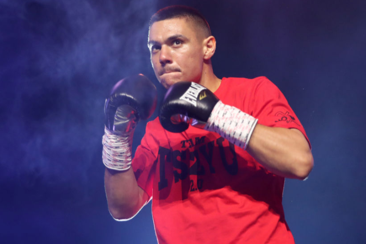 TIM TSZYU walks to the ring for his Australian super welterweight title bout against punches Joe Camilleri at The Star in Sydney, Australia.