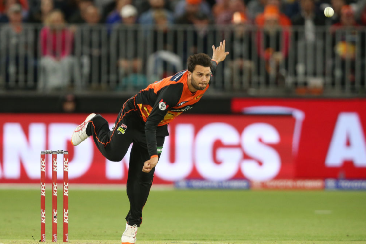 USMAN QADIR of the Scorchers bowls during the Big Bash League match between the Perth Scorchers and the Sydney Thunder at Optus Stadium in Perth, Australia. USMAN QADIR of the Scorchers bowls during the Big Bash League match between the Perth Scorchers and the Sydney Thunder at Optus Stadium in Perth, Australia.