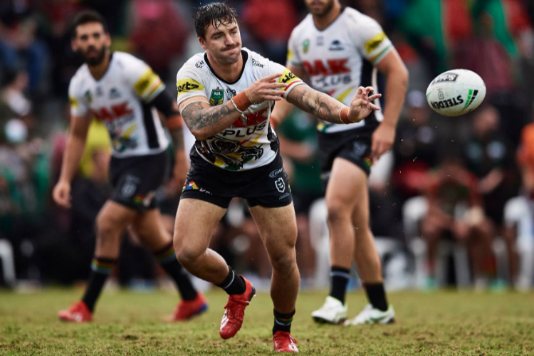 WAYDE EGAN of the Panthers passes the ball during the NRL trial match between the South Sydney Rabbitohs and the Penrith Panthers at Redfern Oval in Sydney, Australia.