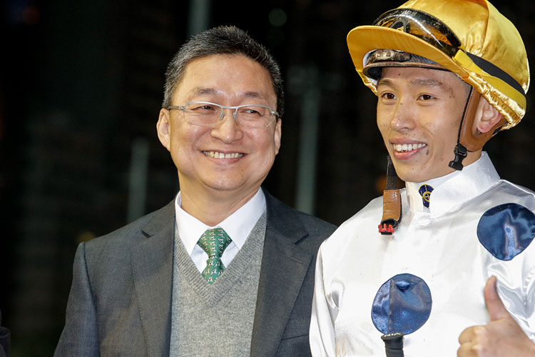 Francis Lui enjoys the moment with jockey Vincent Ho.