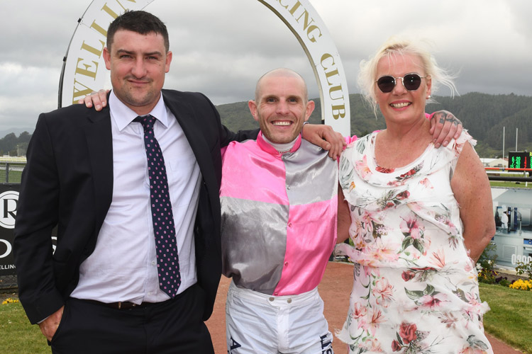 Wyndspelle's co-trainer Johno Benner, jockey Jason Waddell and co-owner Jen Campin pose in the Trentham birdcage on Saturday