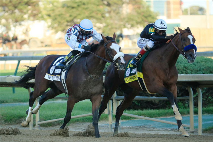 AUTHENTIC (R) winning the Kentucky Derby at Churchill Downs in Louisville.