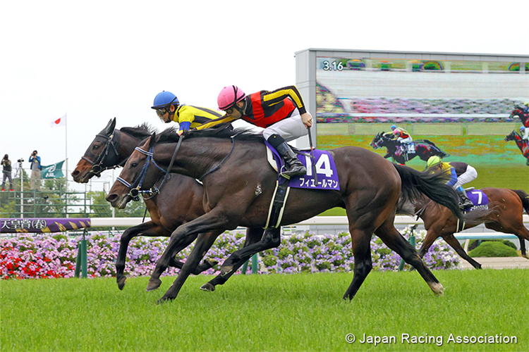 FIEREMENT winning the Tenno Sho (Spring) at Kyoto in Japan.