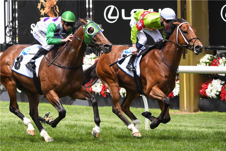 Sansom (inner) battles strongly to claim the Gr.3 Network 10 Chatham Stakes (1400m) at Flemington
