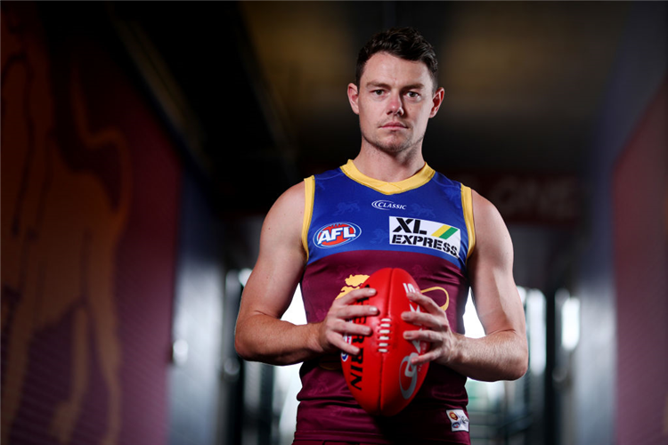 LACHIE NEALE poses during the Brisbane Lions AFL team photo day at The Gabba in Brisbane, Australia.