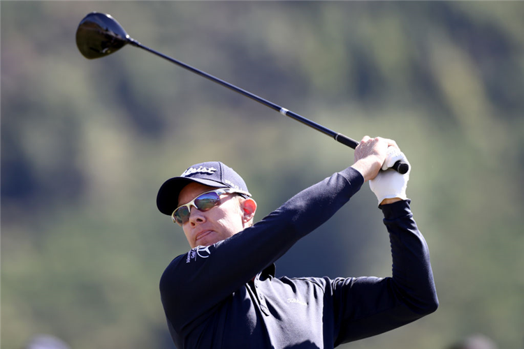 BRAD KENNEDY of Australia tees off during Golf Open at Millbrook Resort in Queenstown, New Zealand.