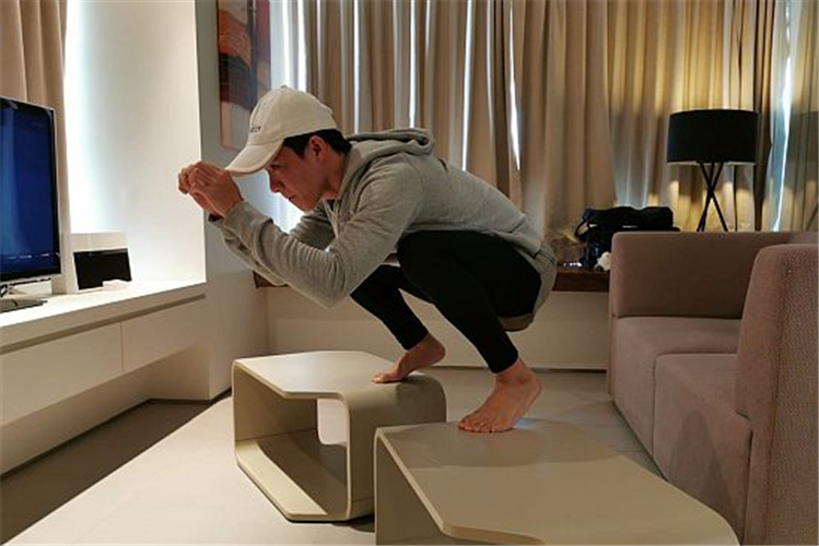 Jockey Wong Chin Chuen works out diligently while serving his stay-home notice in his hotel