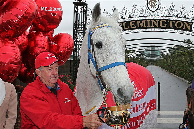Melbourne Cup winning horse Subzero, held by Clerk of the Course, Graham Salisbury.