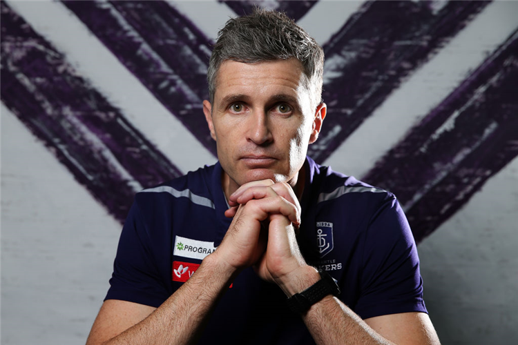 JUSTIN LONGMUIR, coach of the Fremantle Dockers poses following a Fremantle Dockers AFL press conference at the Fremantle Derby Club Lecture Theatre in Perth, Australia.