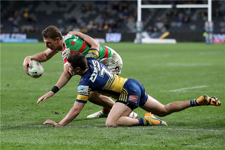 CAMPBELL GRAHAM of the Rabbitohs scores a try during the NRL match between the Parramatta Eels and the South Sydney Rabbitohs at Bankwest Stadium in Sydney, Australia.