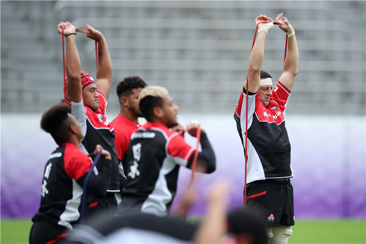 LUKE THOMPSON Japan stretches during a Rugby World Cup Japan team training session at Chichibunomiya Rugby Stadium in Tokyo, Japan.