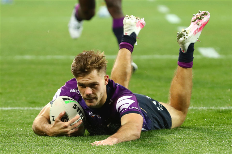 RYAN PAPENHUYZEN of the Storm scores a try during the NRL match between the Melbourne Storm and the South Sydney Rabbitohs at AAMI Park in Melbourne, Australia.