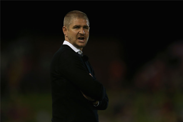 CARL ROBINSON coach of the Newcastle Jets looks on during the A-League match between the Newcastle Jets and the Melbourne Victory at McDonald Jones Stadium in Newcastle, Australia.