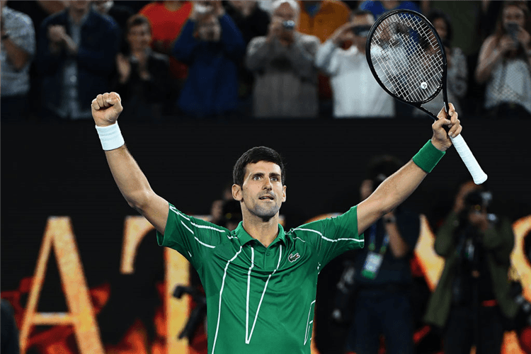 NOVAK DJOKOVIC of Serbia celebrates winning the Australian Open at Melbourne Park in Melbourne, Australia.