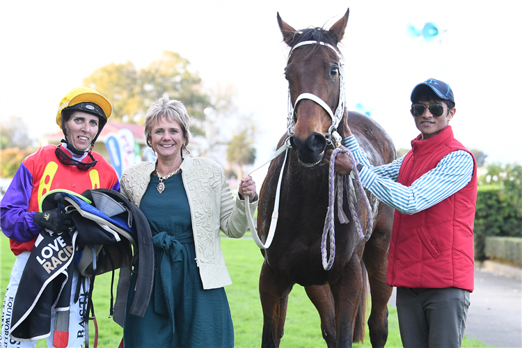 Rider Kate Hercock and trainer Lucy Tanner pose with Listed James Bull Rangitikei Gold Cup (1600m) winner Belle Plaisir