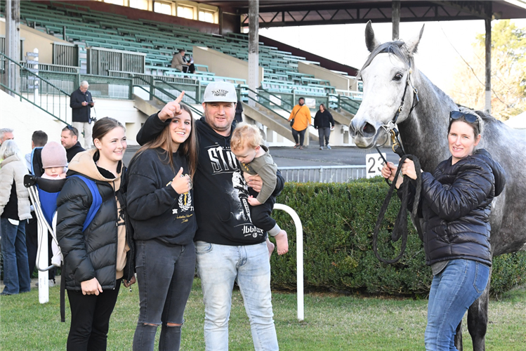 Co-trainer and part-owner Nigel Elliot pictured with his family after El Nymph’s victory at Te Rapa.
