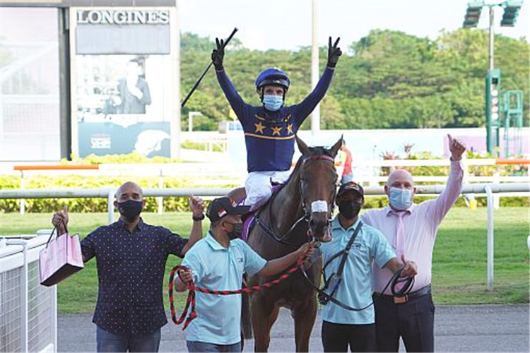 Trainer Daniel Meagher, jockey Danny Beasley and staff celebrate Lim's Lightning's second Group 1 hurrah.