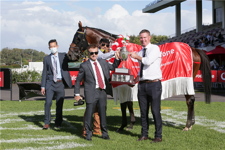 Trainers Lance O’Sullivan (left) and Andrew Scott pose with the Gr.1 Vodafone New Zealand Derby trophy