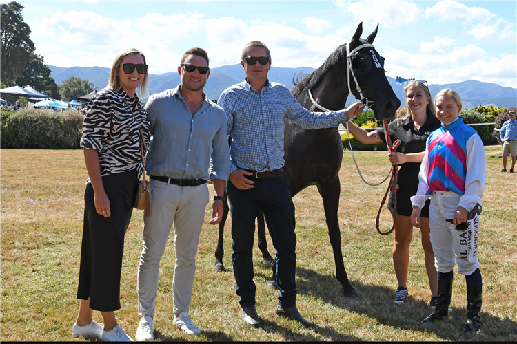 Bredon McCullum and wife Ellissa celebrate the victory of their mare Tabata with trainer Stephen Marsh and jockey Danielle Johnson