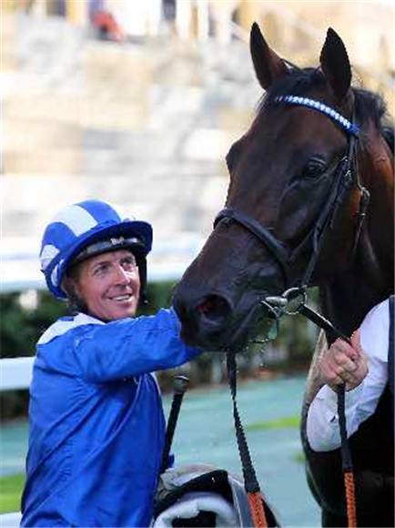 BAAEED and Jim Crowley after winning the Prix Moulin de Longchamp (Group 1).