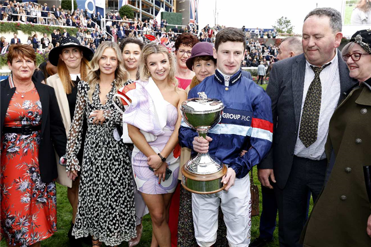 Jockey OISIN MURPHY pictured with Family after winning his 3rd Champion Jockey crown.