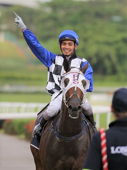 Shafiq Rizuan celebrates his career highlight, the 2015 Group 1 Longines Singapore Gold Cup win with the Patrick Shaw-trained Cooptado.