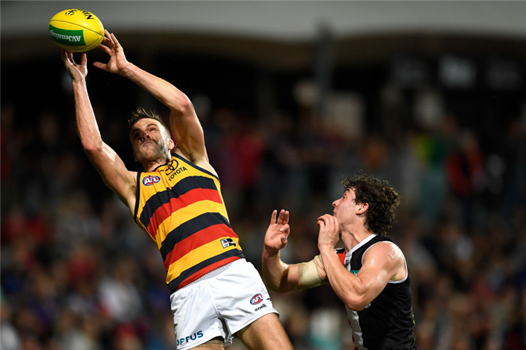 BRODIE SMITH of the Crows competes for the ball during the AFL match between the St Kilda Saints and the Adelaide Crows at Cazaly's Stadium in Cairns, Australia.