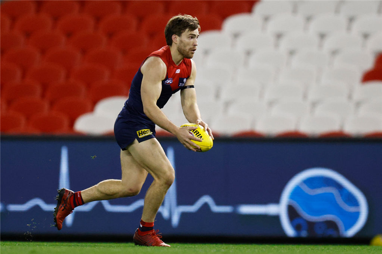 JACK VINEY of the Demons runs with the ball during the AFL match between Gold Coast Suns and Melbourne Demons at Marvel Stadium in Melbourne, Australia.