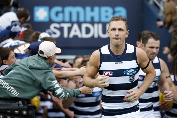 JOEL SELWOOD of the Cats.