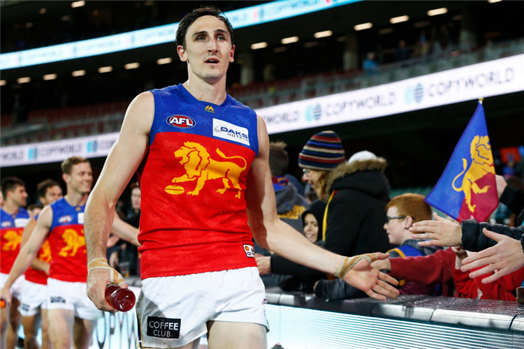 OSCAR MCINERNEY of the Lions greets fans after the AFL match between the Port Adelaide Power and the Brisbane Lions at Adelaide Oval in Adelaide, Australia.