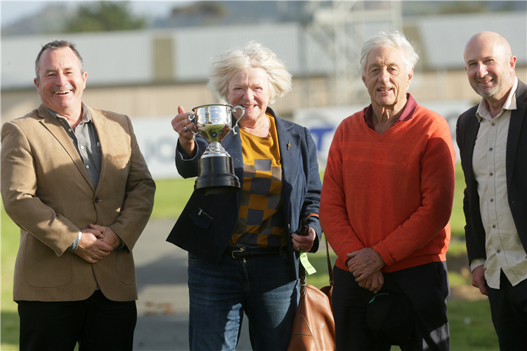 Masetto’s owners Elizabeth (with trophy) and David Olsen (second from right) pose for a winning picture at Ruakaka