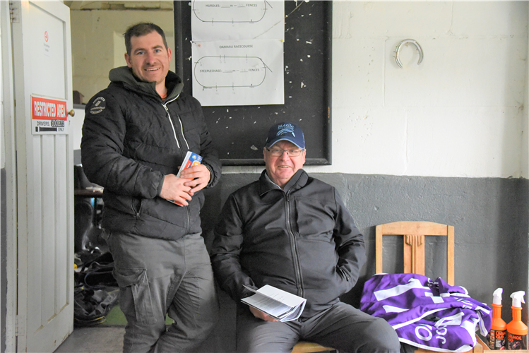 Father and son training partnership Michael (seated) and Matthew Pitman have taken out the title as leading South Island trainer for the 2020/21 racing season
