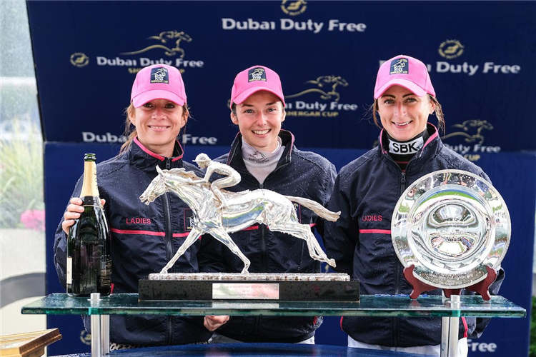 Hayley Turner, Mickaelle Michel and Nicola Currie with the Dubai Duty Free Shergar Cup