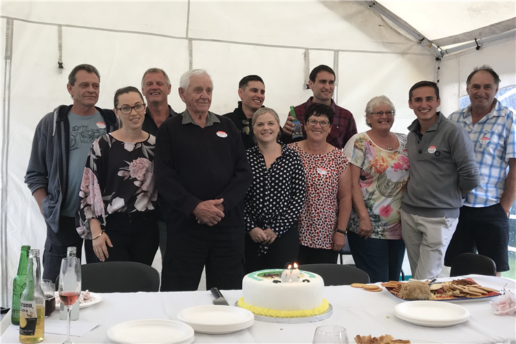 Norm Crawford (fourth from left) pictured with family celebrating his 90th birthday in November 2018.