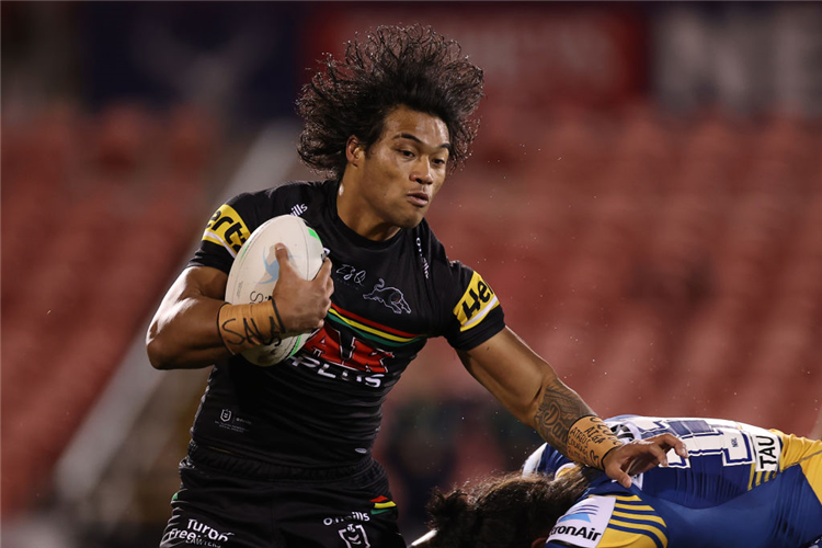 BRIAN TO'O of the Panthers is tackled during the NRL match between the Penrith Panthers and the Parramatta Eels at BlueBet Stadium in Sydney, Australia.