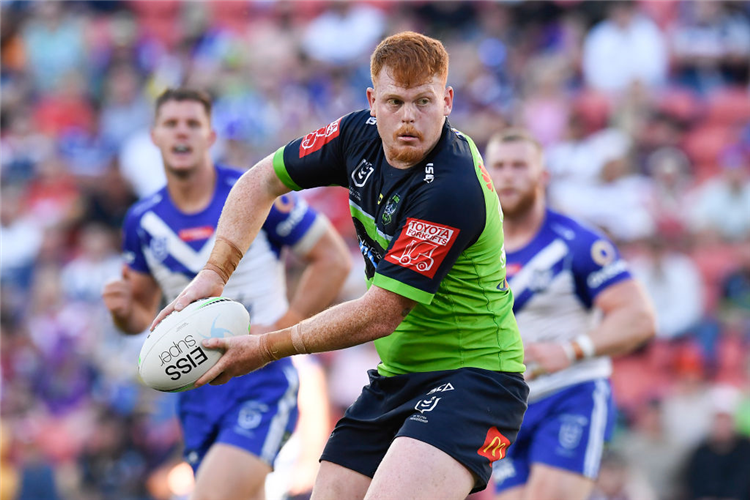 COREY HORSBURGH of the Raiders passes the ball during the NRL match between the Canterbury Bulldogs and the Canberra Raiders at Suncorp Stadium in Brisbane, Australia.