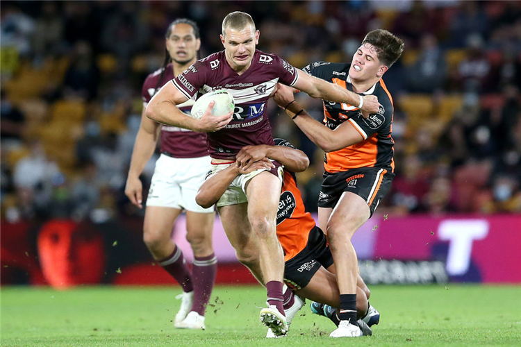 TOM TRBOJEVIC of the Sea Eagles makes a run during the NRL match between the Manly Sea Eagles and the Wests Tigers at Suncorp Stadium in Brisbane, Australia.