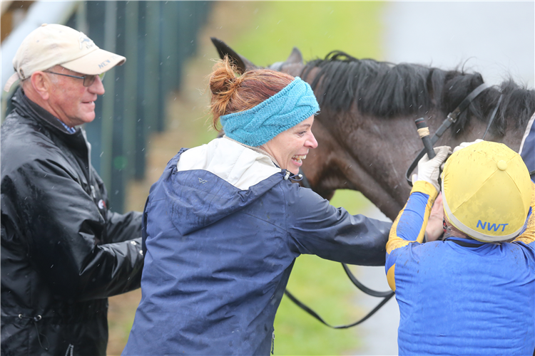 An elated Kylie Grass speaks with Sam Collett after winning with Barbara at Ruakaka