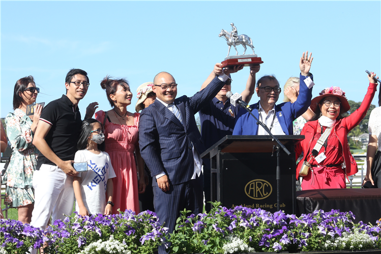 Happy connections celebrate the victory of Dragon Queen at Ellerslie