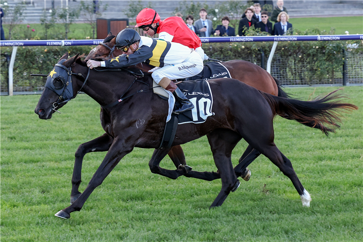 MONBAHER (red cap) winning the Banjo Paterson Final at Flemington in Australia.