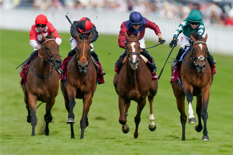 NASHWA (green cap) winning the Nassau Stakes at Goodwood Racecourse in Chichester, England.