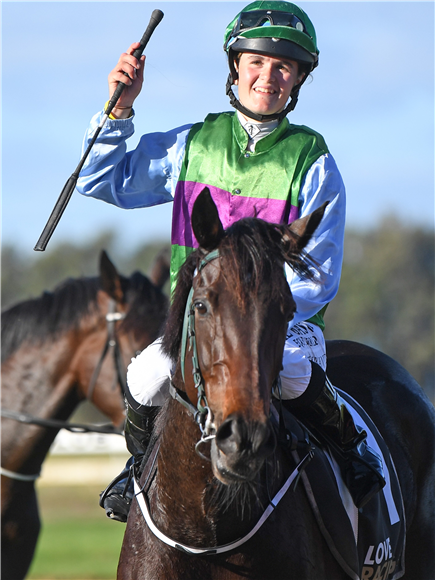 Lily Sutherland after recording her first riding win aboard Shockproof at Hawera on Wednesday