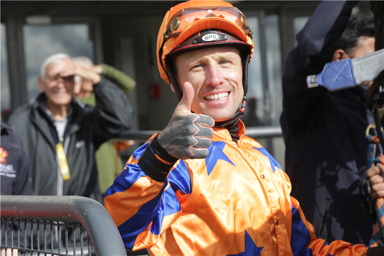 Michael McNab celebrates his 100th winner of the season after piloting Synchronize to victory at Rotorua
