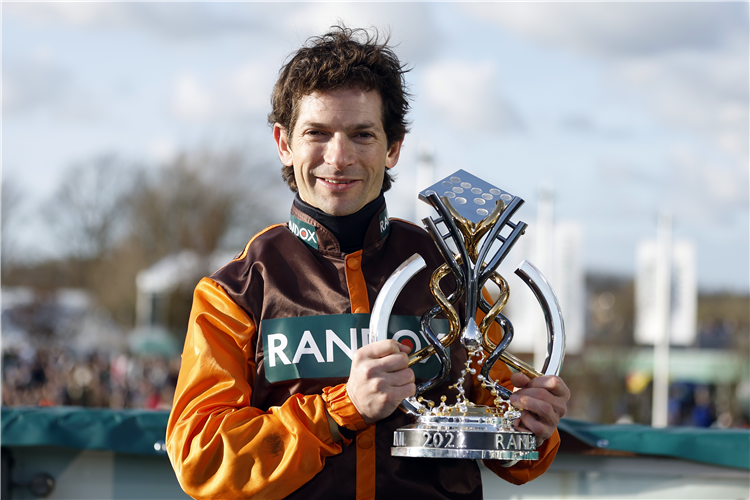 Jockey : Sam Waley-Cohen with the trophy after winning the Randox Grand National.